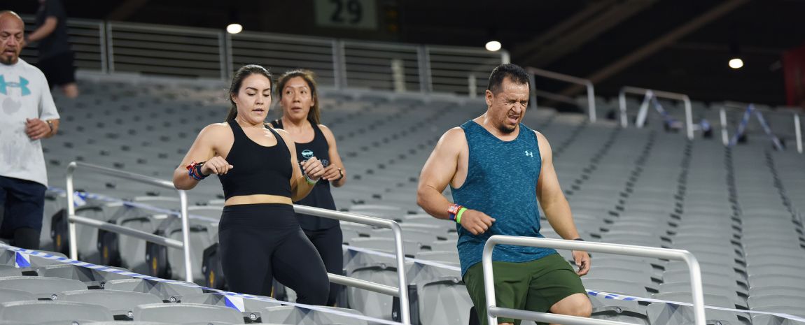 Guests running stadium stairs for a workout